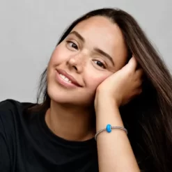 Glittrande havsblå berlock