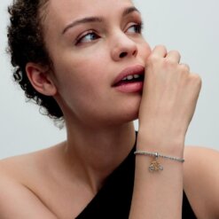 Tvåfärgad hängberlock med snurrande hjul