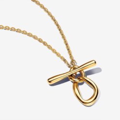 Halsband med organiskt formade cirklar och T-stång