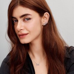 Stiftörhängen med glittrande rosett