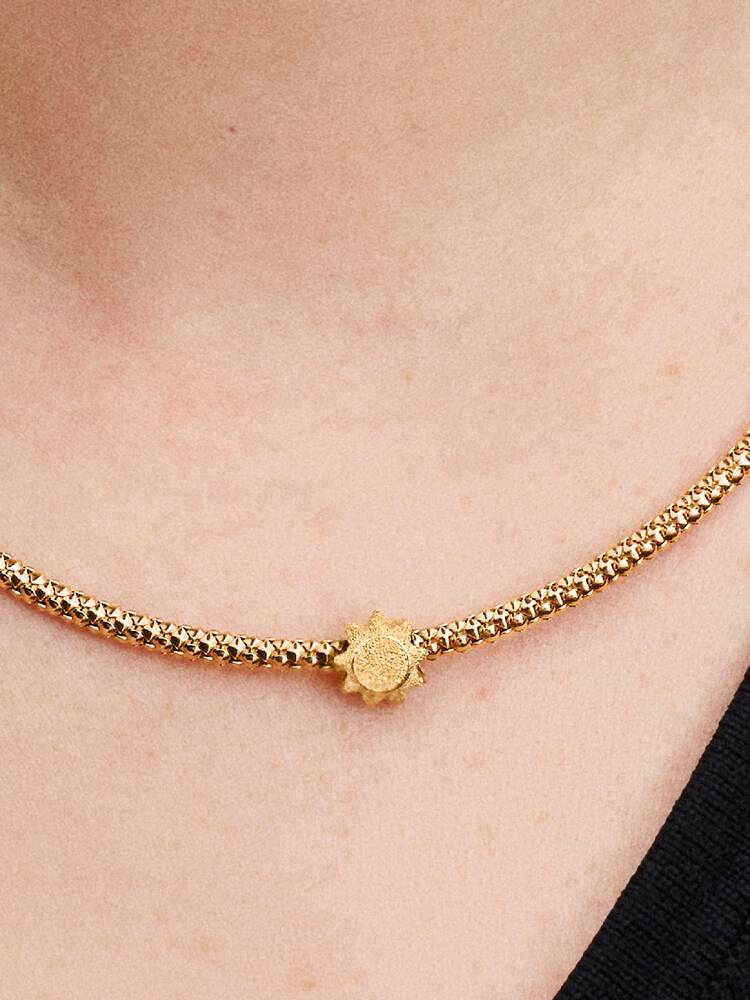 Strukturerad sol miniberlock i guld