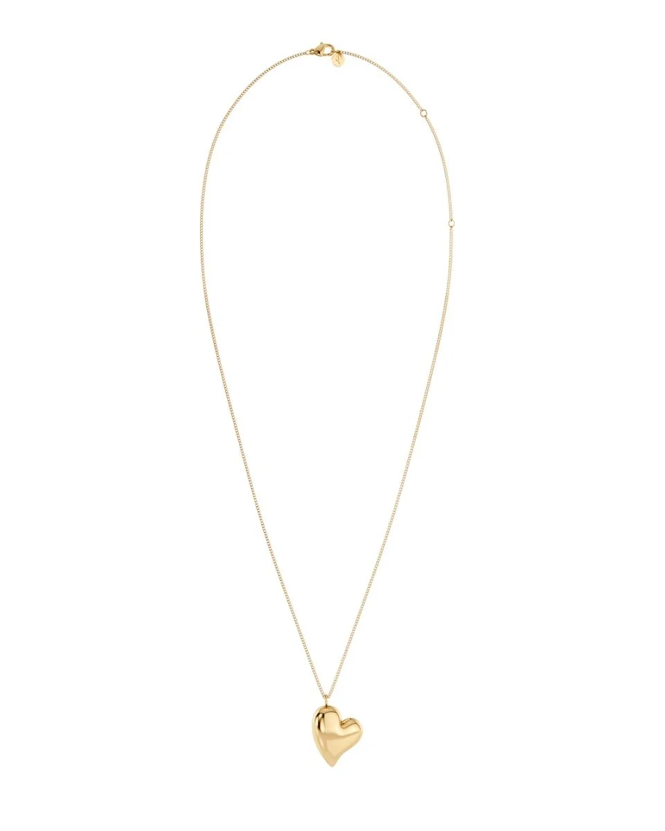 Detaljbild av guldpläterat längre halsband med minimalistiskt hänge