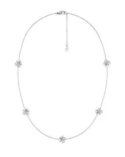 Detaljbild av flerfärgat rostfritt stål halsband med sten-detaljer