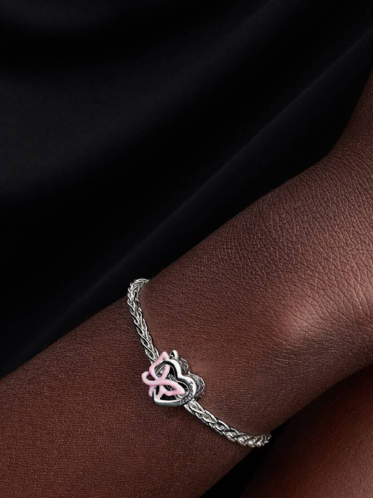Pandora Sammanflätat Hjärta och Fjäril Berlock – openwork design i sterlingsilver