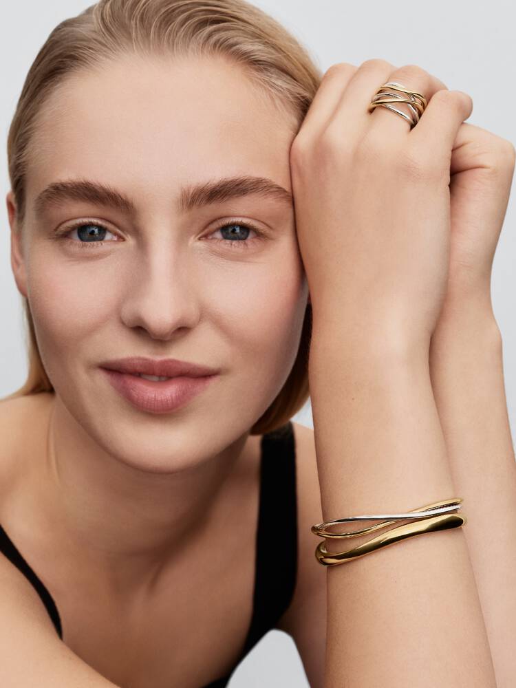 Pandora ring 164673C00 närbild – sammanflätade band i silver och 14k guld Pandora Essence