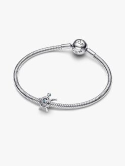 Pandora öppen havssköldpadda berlock sidovy – openwork sterlingsilver turkosa ögon marin Moments 2026